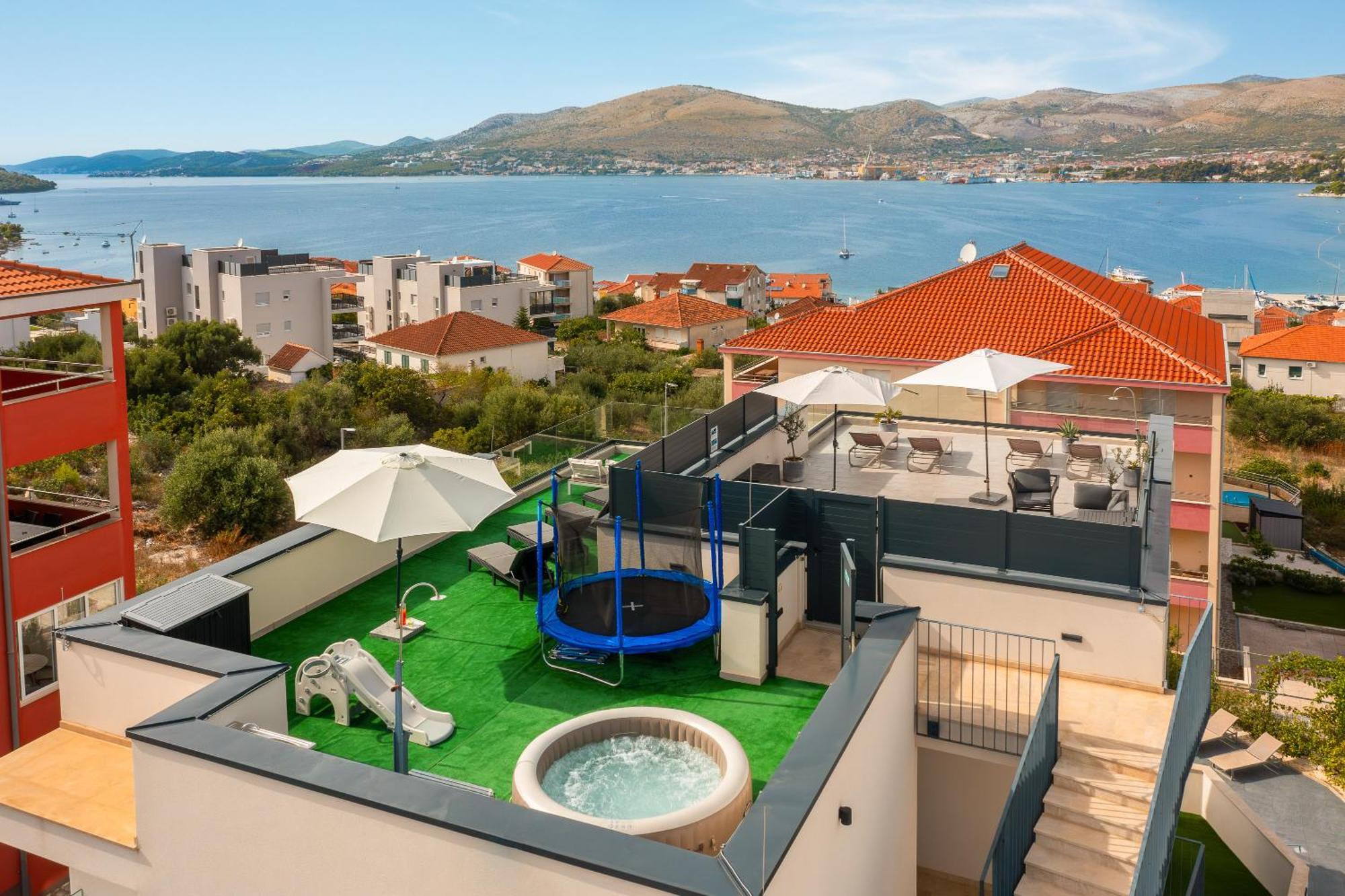 Apartment Alegria In Okrug With Heated Pool, Sea View, Jacuzzi, Wifi Trogir Bagian luar foto